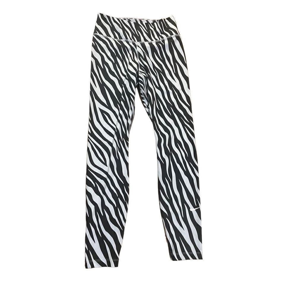 The Nike One Tight Fit Mid Rise zebra animal print leggings 7/8 length S